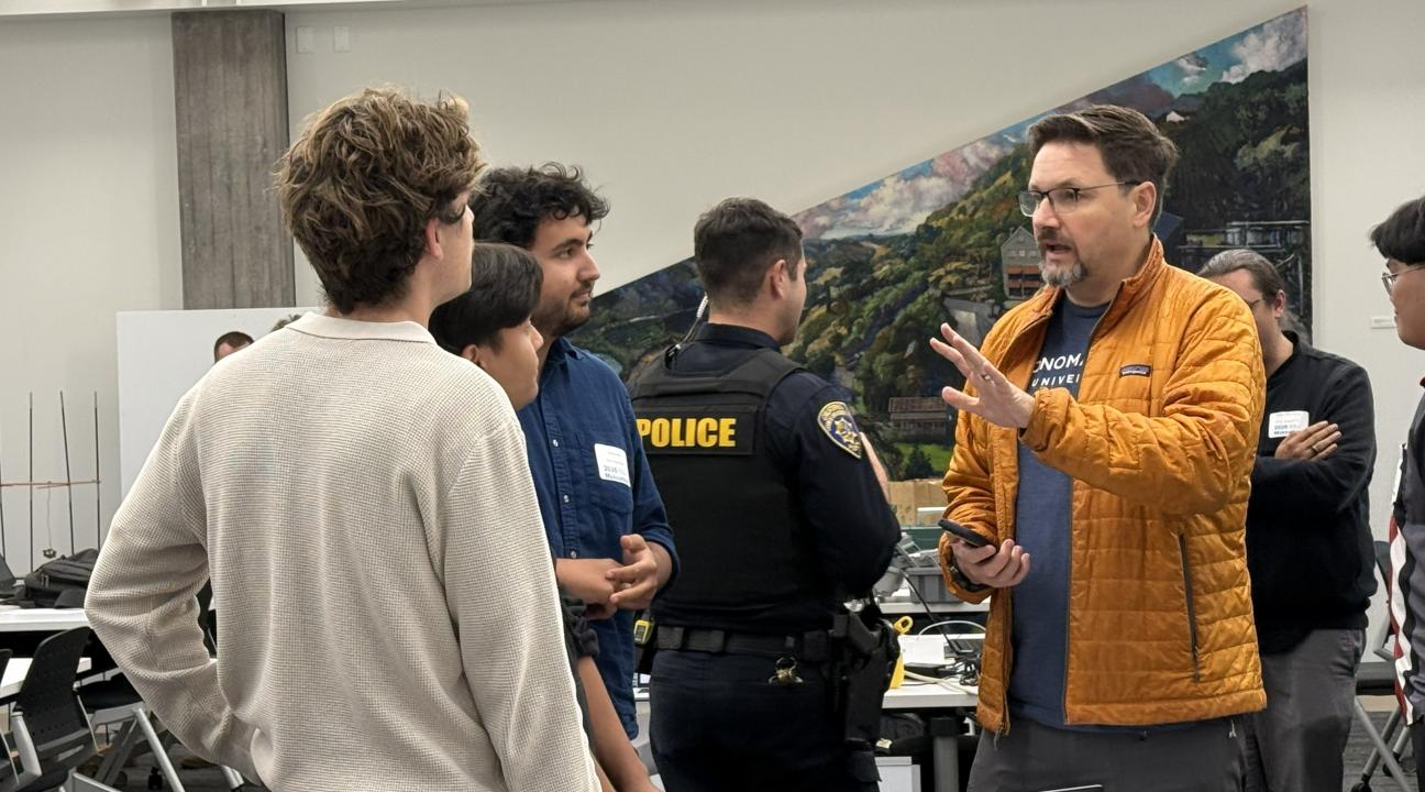 Students Present their Project Demo to a Judge During the 2026 Makeathon